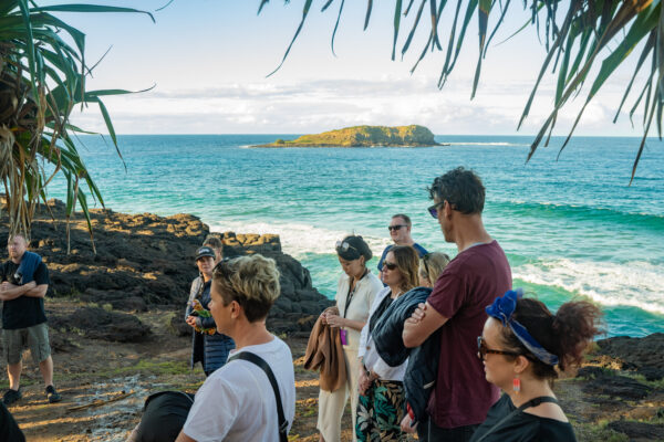 banaam alliance on country cultural experience with group on gold coast ocean near fingal heads