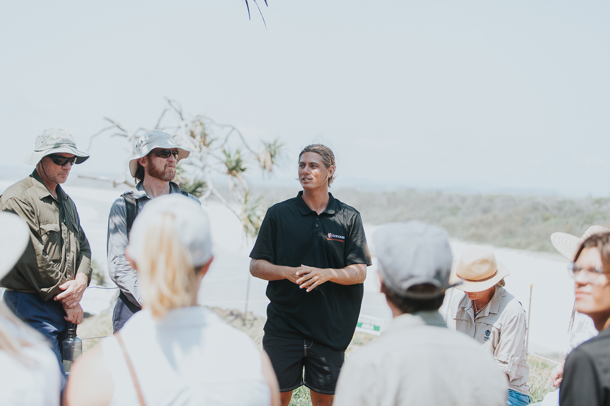 banaam alliance on country cultural experience with group on gold coast ocean near fingal heads