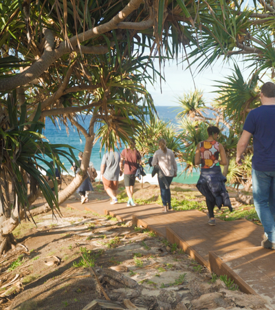 banaam alliance on country cultural experience with group on gold coast ocean near fingal heads