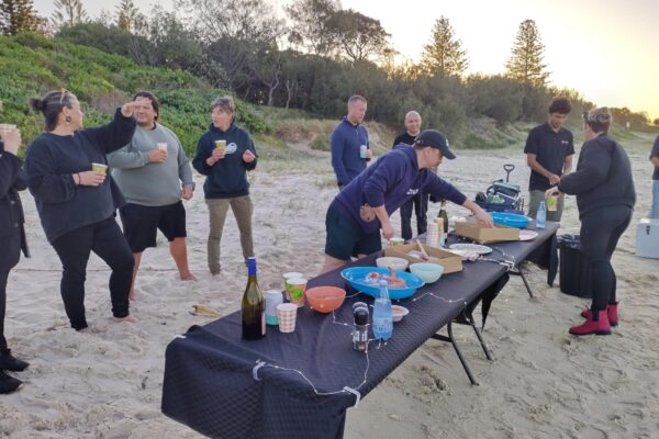 banaam alliance on country cultural experience with group on gold coast ocean near fingal heads