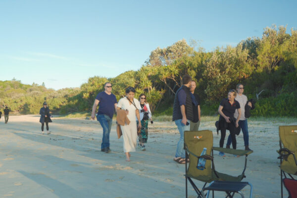 banaam alliance on country cultural experience with group on gold coast ocean near fingal heads