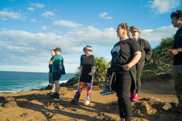 banaam alliance on country cultural experience with group on gold coast ocean near fingal heads